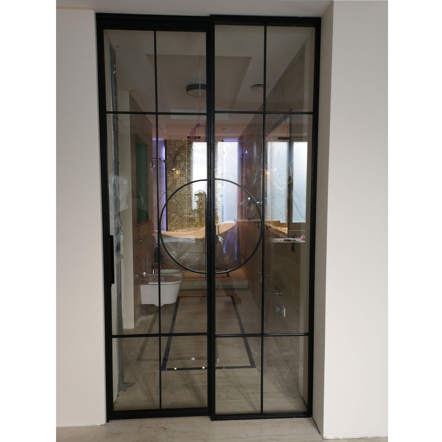 Drzwi LOFT industrialne przesuwne jednoskrzydłowe szklane ściana szklana przeszklona metalowa Loftowymi Krystyna Sz. | Olsztyn 