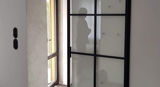 Drzwi przesuwne industrialne loft LOFTOWE szklane przeszklone metalowe producent Aleksandrów Łodź 