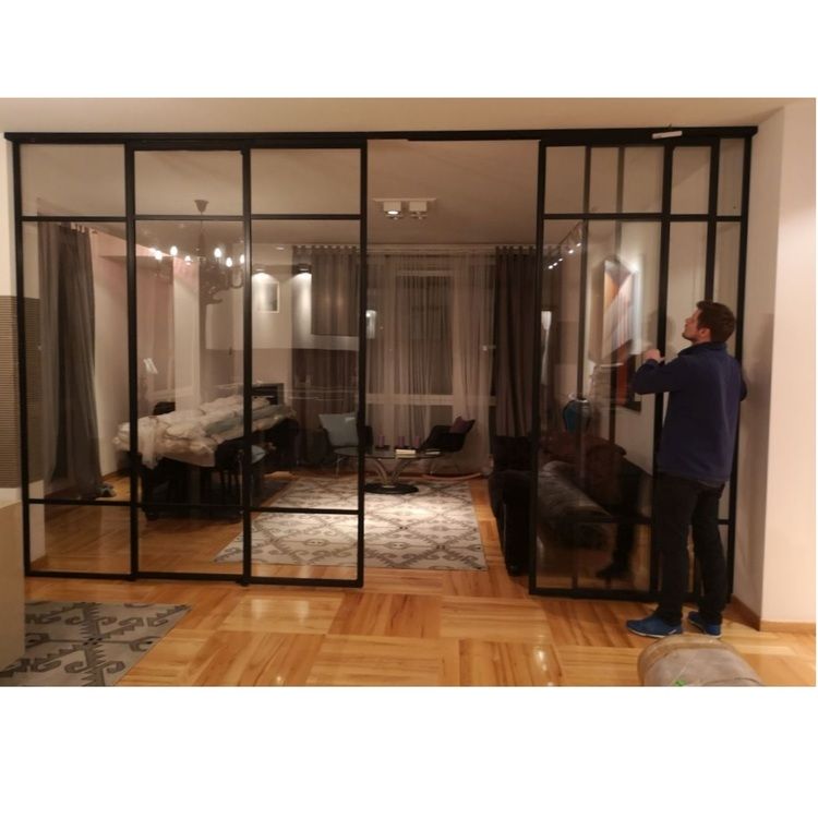 Drzwi LOFT industrialne przesuwne czteroskrzydłowe metalowe szklane Mag Haus